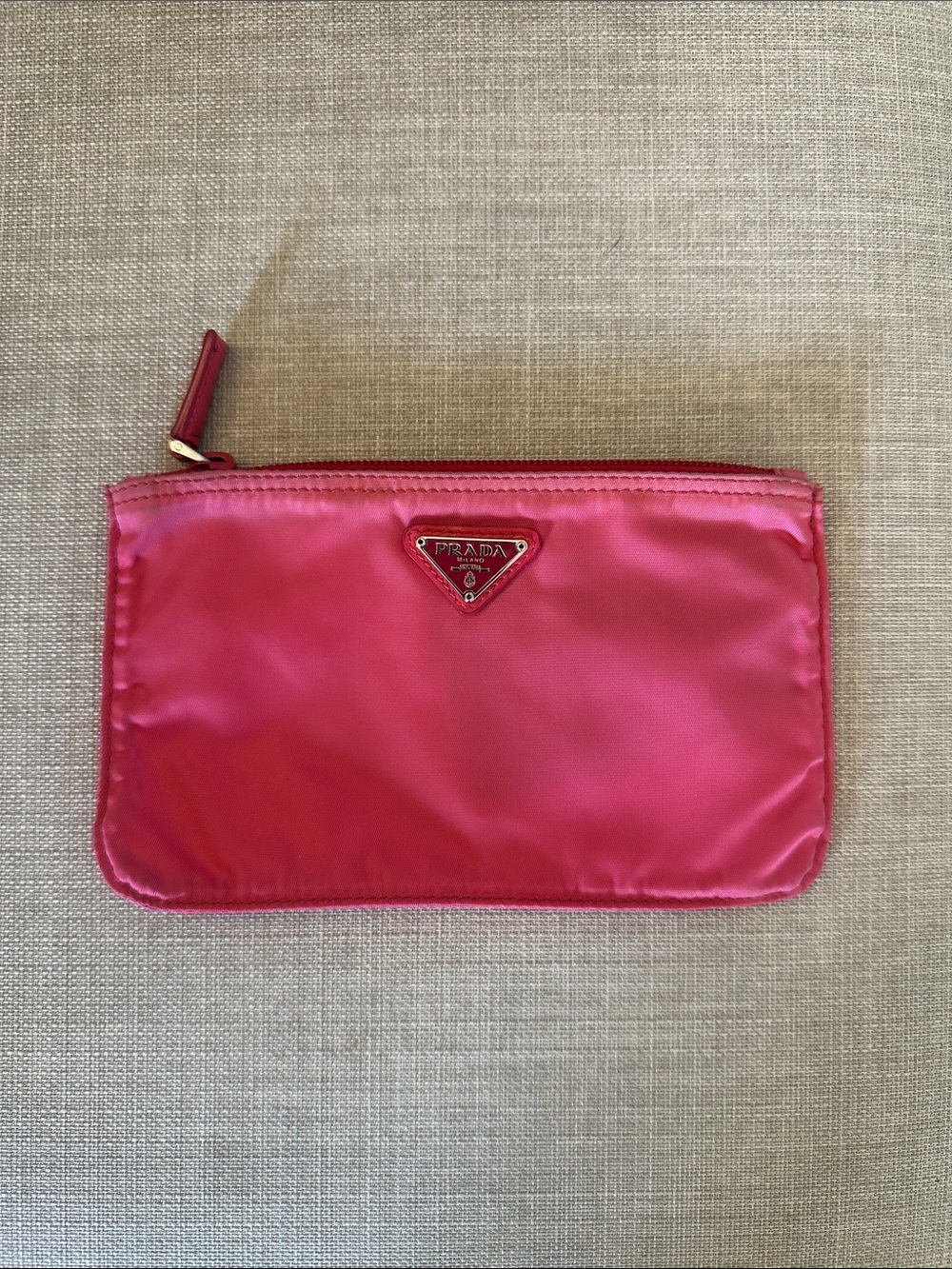 Hot pink prada pouch